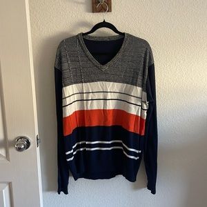 Blue v-neck vest sweater.